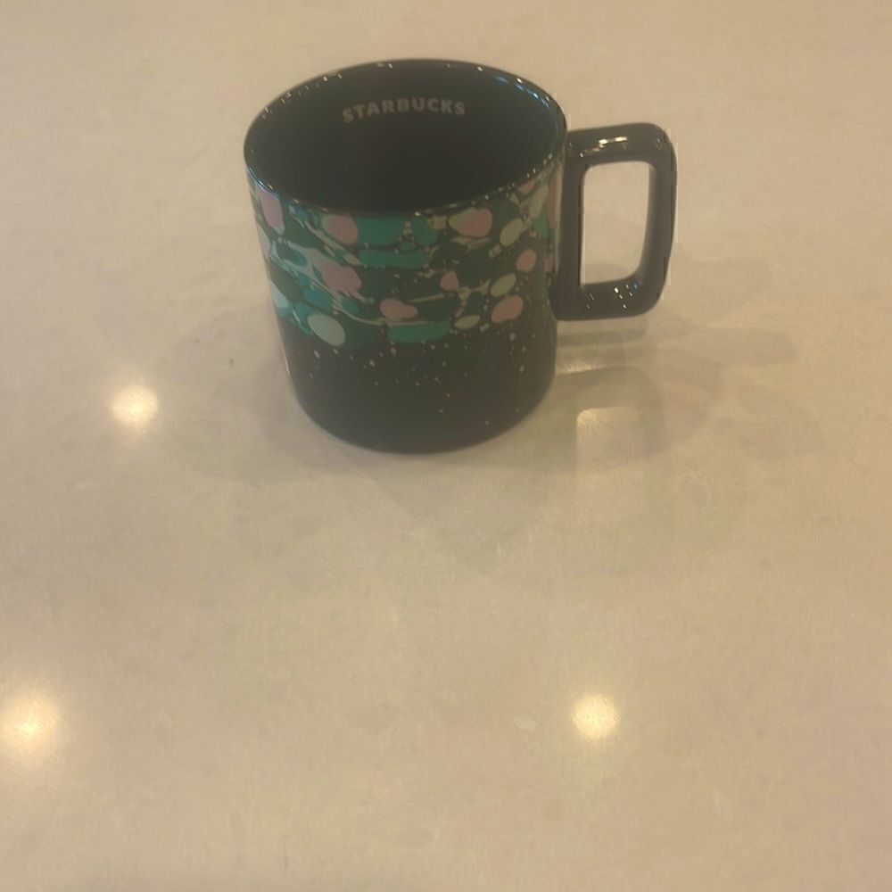Starbucks coffee cup 2022, excellent condition nice shaped handle for comfort.
